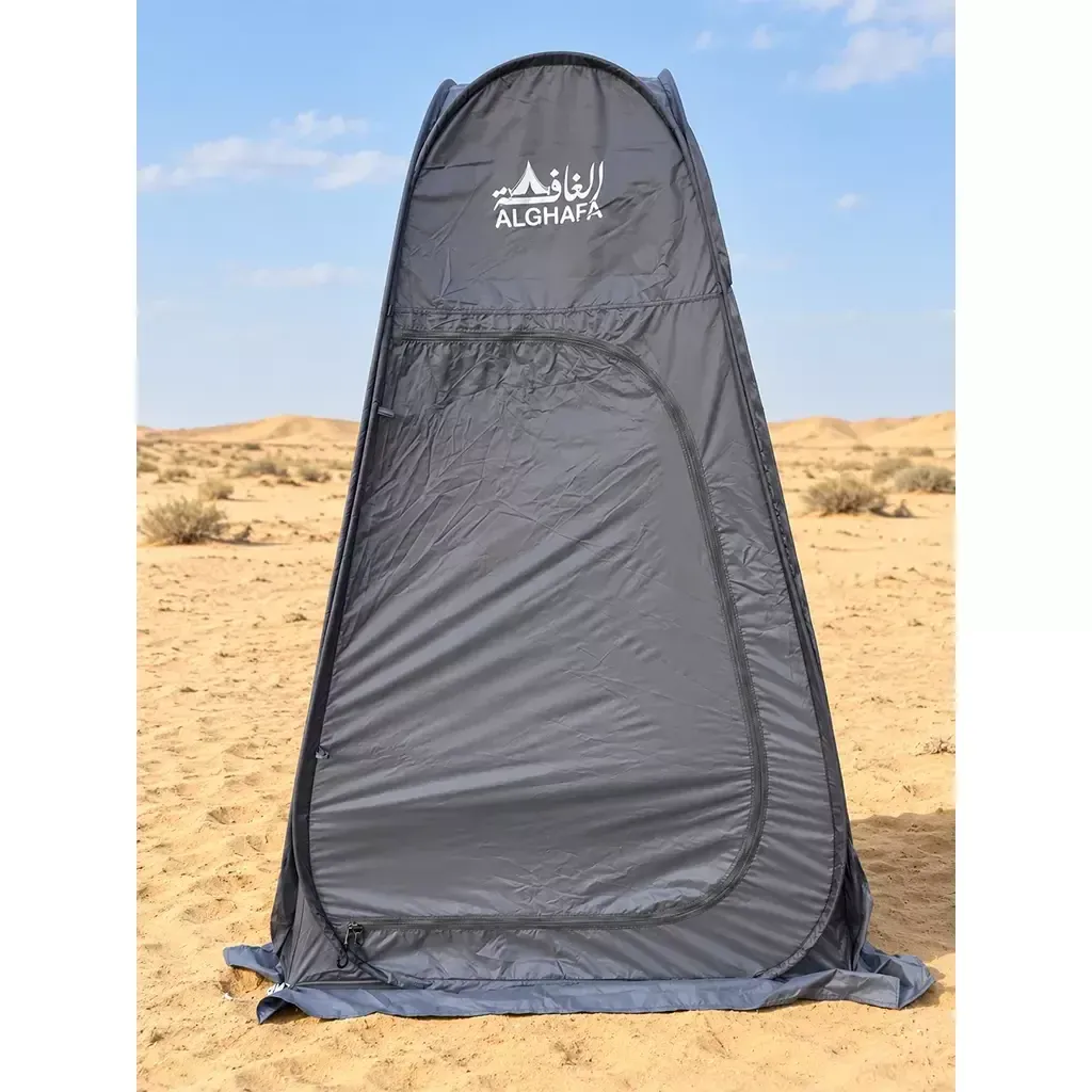 ALGHAFA grey pop-up toilet tent with silver reflective interior and zipped door in the desert