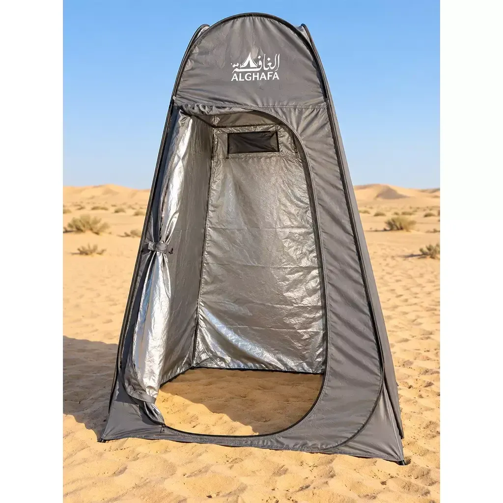 ALGHAFA grey pop-up toilet tent with silver reflective interior and zipped door in the desert